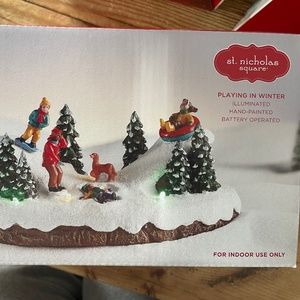 St. Nicholas Playing in Winter